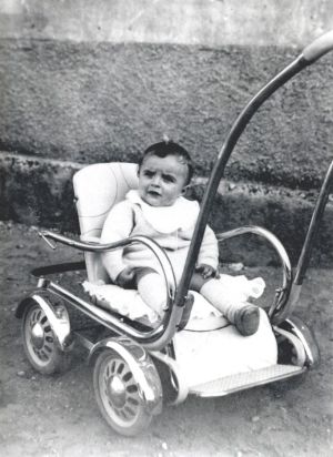 Lucio Perego in one of the first Peg Perego strollers created by Guiseppe Perego.